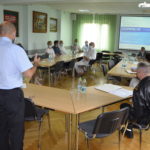 Komendant oraz Naczelnik wydziału operacyjnego podczas spotkania z przedstawicielami władz samorządowych.
